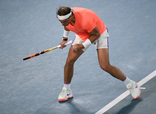 223 2 Nadal blows 2 set lead against Tsitsipas in Australia AP News